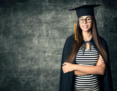 Student in Graduation Hat, Woman in Glasses Mortarboard over Bla