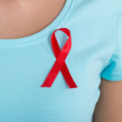 Woman Wearing Aids Awareness Ribbon